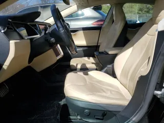2014 Tesla Model S 60 with VIN 5YJSA1H10EFP34137, listed as a Copart auction lot 47645795 with Not provided miles and Salvage title. Bid and sale history available at DreamBid. Image 7.
