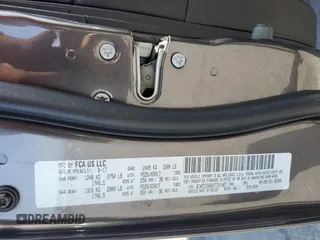 2017 Dodge Journey SXT with VIN 3C4PDCBB5HT701487, listed as a Copart auction lot 58821045 with 118,585 mi miles and Salvage title. Bid and sale history available at DreamBid. Image 13.