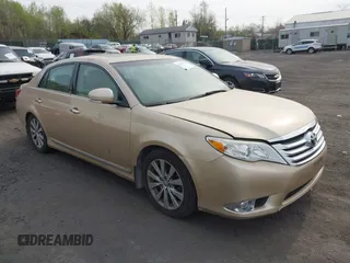 2011 Toyota Avalon with VIN 4T1BK3DB5BU414687, listed as a IAAI auction lot 42103830 with 130,045 mi miles and . Bid and sale history available at carsss.com. Image 1.