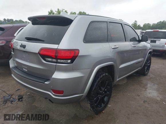 2018 Jeep Grand Cherokee Laredo E with VIN 1C4RJFAG6JC452859, listed as a IAAI auction lot 42647127 with 107,869 mi miles and . Bid and sale history available at DreamBid. Image 4.