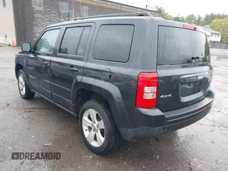 2014 Jeep Patriot Latitude with VIN 1C4NJRFB6ED689459, listed as a IAAI auction lot 42197469 with 202,899 mi miles. Bid and sale history available at carsss.com. Image 3.