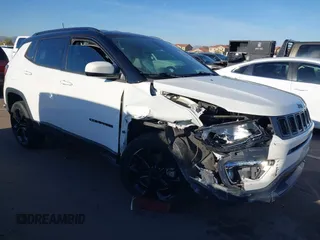 2020 Jeep Compass Latitude with VIN 3C4NJDBBXLT203932, listed as a IAAI auction lot 41830978 with 49,421 mi miles. Bid and sale history available at carsss.com. Image 1.