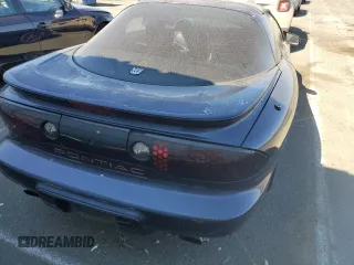 2000 Pontiac Firebird Firebird z VIN 2G2FS22K8Y2116172, wystawiony jako Copart lot #68748904 z przebiegiem Nie podano mil oraz Czysty tytuł • Clean title. Historia ofert i sprzedaży dostępna na DreamBid. Obrazek 6.