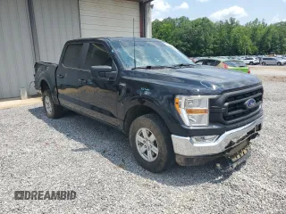 2022 Ford F-150 XL with VIN 1FTFW1E51NFA04887, listed as a Copart auction lot 55734705 with 123,590 mi miles and Salvage title. Bid and sale history available at DreamBid. Image 4.