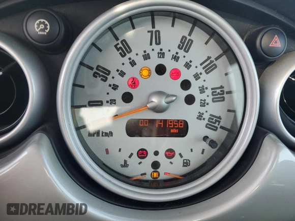 2004 MINI Hardtop with VIN WMWRC33464TJ62893, listed as a Copart auction lot 51905565 with 141,958 mi miles and Salvage Title. Bid and sale history available at DreamBid. Image 9.