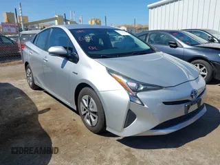 2016 Toyota Prius Four z VIN JTDKARFU0G3521720, wystawiony jako IAAI lot #42312196 z przebiegiem 145 398 mil mil oraz . Historia ofert i sprzedaży dostępna na DreamBid. Obrazek 1.