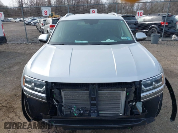 2018 Volkswagen Atlas SE with VIN 1V2KR2CA6JC560411, listed as a IAAI auction lot 41887472 with 168,155 mi miles and . Bid and sale history available at DreamBid. Image 13.