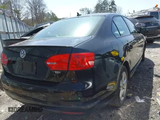 2012 Volkswagen Jetta Sedan TDI w/Premium & Nav with VIN 3VWLL7AJ1CM334735, listed as a IAAI auction lot 41749312 with 196,237 mi miles. Bid and sale history available at carsss.com. Image 4.