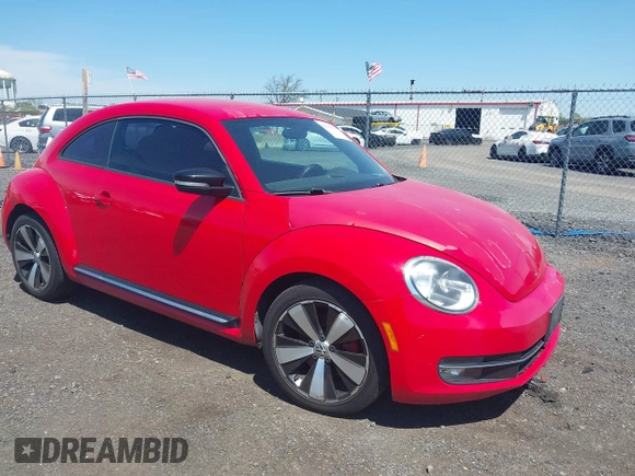 2012 Volkswagen Beetle 2.0T Turbo w/Sun/Snd/Nav PZEV with VIN 3VWVA7AT4CM608798, listed as a IAAI auction lot 42130353 with 152,052 mi miles. Bid and sale history available at carsss.com. Image 1.