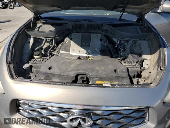 2009 Infiniti FX z VIN JNRAS18U59M102900, wystawiony jako Copart lot #49550615 z przebiegiem 258 370 mil mil oraz Szkoda całkowita • Salvage title. Historia ofert i sprzedaży dostępna na DreamBid. Obrazek 13.