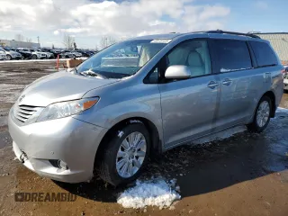 2011 Toyota Sienna XLE with VIN 5TDDK3DC8BS008767, listed as a Copart auction lot 48519725 with 263,023 mi miles and Salvage title. Bid and sale history available at DreamBid. Image 1.