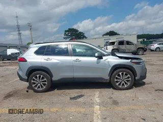 2023 Toyota Corolla Cross XLE with VIN 7MUDAAAG0PV057750, listed as a IAAI auction lot 42302284 with 31,404 mi miles and . Bid and sale history available at DreamBid. Image 13.