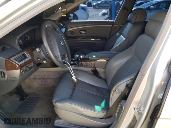 2003 BMW 7 Series 745i with VIN WBAGL63473DP68267, listed as a Copart auction lot 69923064 with 100,468 mi miles and Salvage title. Bid and sale history available at DreamBid. Image 7.