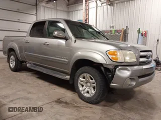 2004 Toyota Tundra SR5 with VIN 5TBDT44104S441271, listed as a IAAI auction lot 41823831 with 296,637 mi miles and . Bid and sale history available at DreamBid. Image 1.