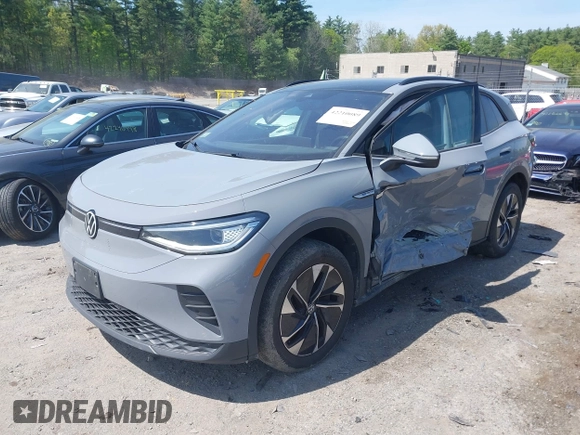 2022 Volkswagen ID.4 Pro S z VIN WVGGNPE24NP059968, wystawiony jako IAAI lot #42210089 z przebiegiem 36 860 mil mil oraz . Historia ofert i sprzedaży dostępna na DreamBid. Obrazek 2.