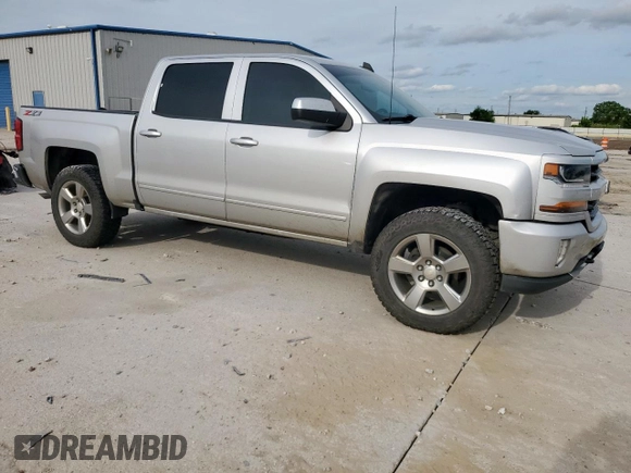 2018 Chevrolet Silverado 1500 LT with VIN 3GCUKREC3JG462083, listed as a Copart auction lot 56346705 with 166,454 mi miles and Clean Title. Bid and sale history available at DreamBid. Image 4.
