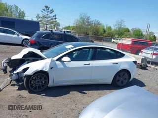 2023 Tesla Model 3 z VIN 5YJ3E1EA5PF553275, wystawiony jako IAAI lot #42132154 z przebiegiem Nie podano mil oraz . Historia ofert i sprzedaży dostępna na DreamBid. Obrazek 14.