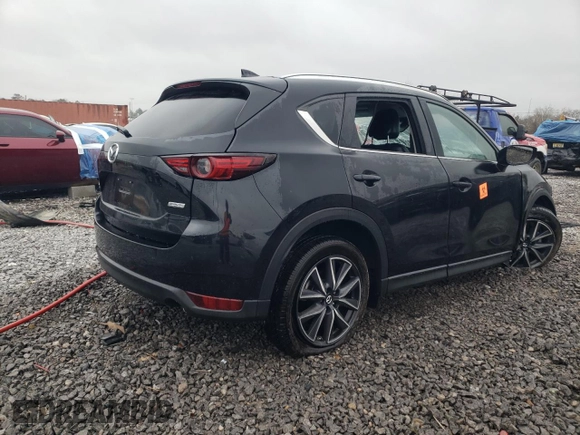2018 Mazda CX-5 Grand Touring z VIN JM3KFBDM0J0403095, wystawiony jako Copart lot #48594495 z przebiegiem Nie podano mil oraz Szkoda całkowita • Salvage title. Historia ofert i sprzedaży dostępna na DreamBid. Obrazek 3.