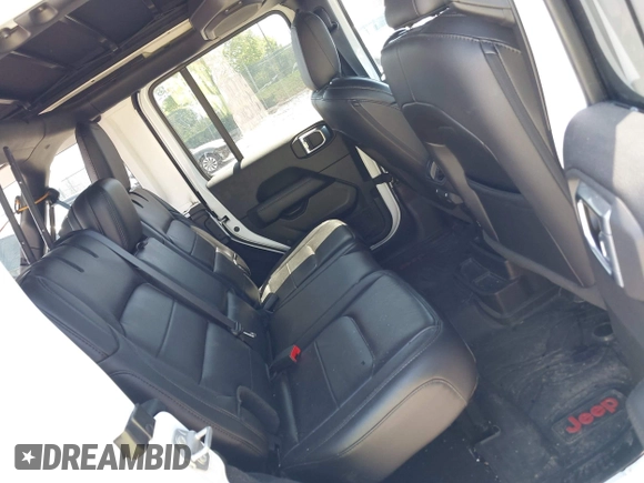 2021 Jeep Wrangler Unlimited Sahara z VIN 1C4HJXEN2MW528137, wystawiony jako IAAI lot #42134514 z przebiegiem 50 030 mil mil oraz . Historia ofert i sprzedaży dostępna na DreamBid. Obrazek 8.