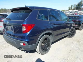 2020 Honda Passport EX-L with VIN 5FNYF7H58LB005866, listed as a IAAI auction lot 41695363 with Not provided miles and . Bid and sale history available at DreamBid. Image 4.