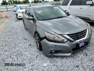 2016 Nissan Altima SR with VIN 1N4BL3AP2GC261691, listed as a Copart auction lot 59661695 with 101,846 mi miles and Salvage title. Bid and sale history available at DreamBid. Image 13.