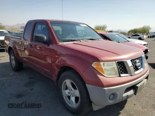 2006 Nissan Frontier XE with VIN 1N6BD06T76C453552, listed as a Copart auction lot 62901325 with 180,576 mi miles and Salvage title. Bid and sale history available at DreamBid. Image 4.