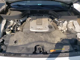 2016 Infiniti QX70 z VIN JN8CS1MU4GM670023, wystawiony jako Copart lot #59185875 z przebiegiem 123 880 mil mil oraz Szkoda całkowita • Salvage title. Historia ofert i sprzedaży dostępna na DreamBid. Obrazek 12.