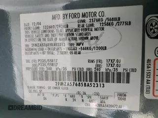 2005 Ford Freestar SES z VIN 2FMZA57685BA52313, wystawiony jako Copart lot #57564685 z przebiegiem 174 302 mil mil oraz Szkody całkowita. Historia ofert i sprzedaży dostępna na DreamBid. Obrazek 13.