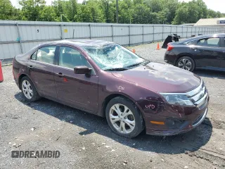 2012 Ford Fusion SE z VIN 3FAHP0HAXCR253297, wystawiony jako Copart lot #60302645 z przebiegiem 138 619 mil mil oraz Szkoda całkowita • Salvage title. Historia ofert i sprzedaży dostępna na DreamBid. Obrazek 4.