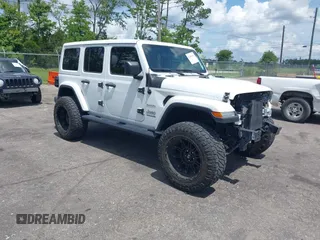 2021 Jeep Wrangler Unlimited Sahara Altitude z VIN 1C4HJXEN7MW518395, wystawiony jako IAAI lot #42484314 z przebiegiem 55 000 mil mil oraz . Historia ofert i sprzedaży dostępna na DreamBid. Obrazek 1.