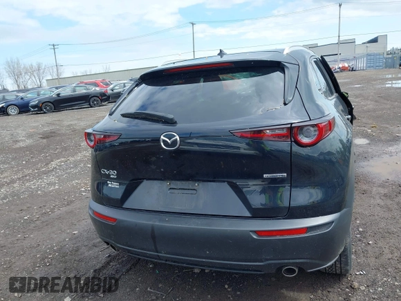 2022 Mazda CX-30 S Premium with VIN 3MVDMBDL5NM413878, listed as a IAAI auction lot 42189008 with 46,249 mi miles and . Bid and sale history available at DreamBid. Image 16.