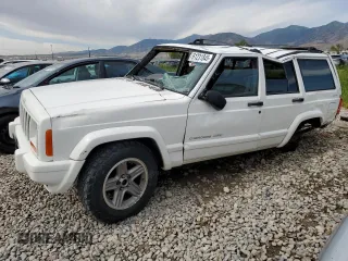 2000 Jeep Cherokee Classic with VIN 1J4FF58S7YL133399, listed as a Copart auction lot 61231845 with 196,499 mi miles and Salvage title. Bid and sale history available at DreamBid. Image 1.