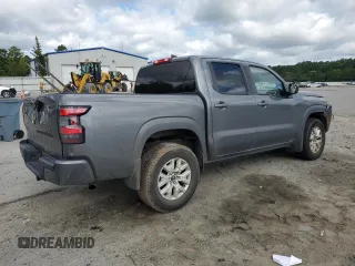 2022 Nissan Frontier SV with VIN 1N6ED1EK8NN680666, listed as a Copart auction lot 59164865 with 57,697 mi miles and Salvage title. Bid and sale history available at DreamBid. Image 3.
