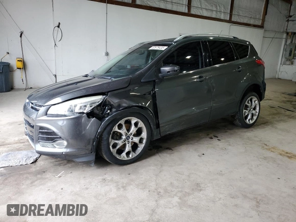2016 Ford Escape Titanium with VIN 1FMCU9JX9GUB94754, listed as a Copart auction lot 52679435 with 176,075 mi miles and Salvage Title. Bid and sale history available at DreamBid. Image 1.