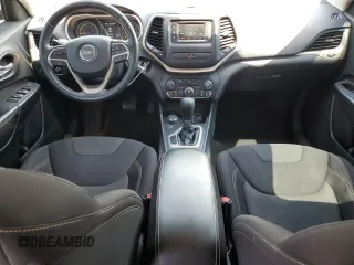 2015 Jeep Cherokee Latitude with VIN 1C4PJMCB6FW644818, listed as a Copart auction lot 62888835 with 262,063 mi miles and Salvage title. Bid and sale history available at DreamBid. Image 8.