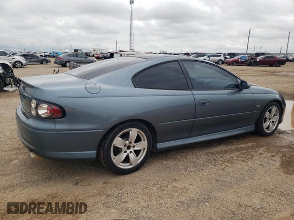 2006 Pontiac GTO z VIN 6G2VX12U06L550451, wystawiony jako Copart lot #54823105 z przebiegiem 273 049 mil mil oraz Tytuł czysty. Historia ofert i sprzedaży dostępna na DreamBid. Obrazek 3.
