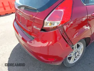 2017 Ford Fiesta SE z VIN 3FADP4EJ4HM168566, wystawiony jako IAAI lot #42223504 z przebiegiem 53 572 mil mil oraz . Historia ofert i sprzedaży dostępna na DreamBid. Obrazek 6.