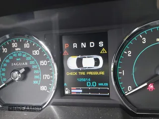 2012 Jaguar XF Portfolio with VIN SAJWA0HB5CLS21062, listed as a IAAI auction lot 41733179 with 125,614 mi miles. Bid and sale history available at carsss.com. Image 7.