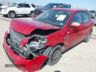 2011 Kia Rio LX with VIN KNADH4A34B6848891, listed as a IAAI auction lot 41678155 with 152,021 mi miles. Bid and sale history available at carsss.com. Image 2.