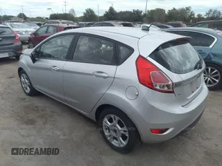 2016 Ford Fiesta SE with VIN 3FADP4EJ0GM198338, listed as a IAAI auction lot 28660870 with 68,135 mi miles. Bid and sale history available at carsss.com. Image 3.