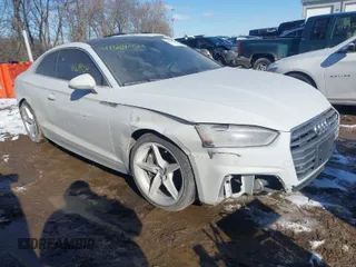 2018 Audi A5 Premium Plus with VIN WAUTNAF57JA026143, listed as a IAAI auction lot 41639054 with 118,022 mi miles and . Bid and sale history available at DreamBid. Image 1.