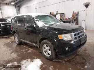 2010 Ford Escape XLT with VIN 1FMCU9DG2AKB66471, listed as a IAAI auction lot 41752494 with 198,489 mi miles. Bid and sale history available at carsss.com. Image 1.