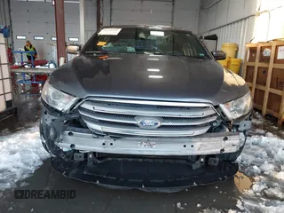 2013 Ford Taurus SEL z VIN 1FAHP2E89DG150197, wystawiony jako IAAI lot #41214999 z przebiegiem 146 307 mil mil oraz . Historia ofert i sprzedaży dostępna na DreamBid. Obrazek 6.