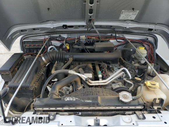 2005 Jeep Wrangler X with VIN 1J4FA39S55P353789, listed as a Copart auction lot 62469015 with 143,817 mi miles and Salvage title. Bid and sale history available at DreamBid. Image 11.