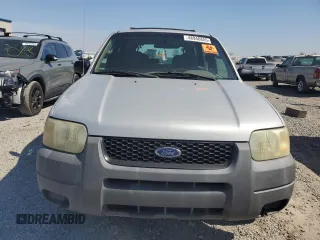2002 Ford Escape XLS Choice with VIN 1FMYU02112KB00947, listed as a Copart auction lot 48948855 with 223,287 mi miles and Salvage title. Bid and sale history available at DreamBid. Image 5.