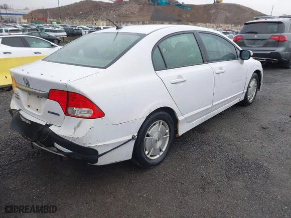 2010 Honda Civic Hybrid with VIN JHMFA3F23AS005117, listed as a IAAI auction lot 41956295 with 211,151 mi miles. Bid and sale history available at carsss.com. Image 4.