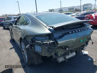 2023 Porsche Panamera with VIN WP0AJ2A78PL103586, listed as a IAAI auction lot 42489914 with 19,902 mi miles and . Bid and sale history available at DreamBid. Image 3.