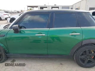 2022 MINI Hardtop 4 Door Cooper z VIN WMW33DK04N2P84250, wystawiony jako IAAI lot #42059692 z przebiegiem 34 238 mil mil oraz . Historia ofert i sprzedaży dostępna na DreamBid. Obrazek 15.