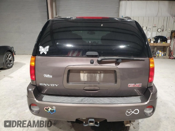 2008 GMC Envoy SLE2 with VIN 1GKDS13S482236329, listed as a Copart auction lot 87001674 with 150,807 mi miles and Salvage Title. Bid and sale history available at carsss.com. Image 6.