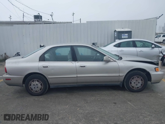 1997 Honda Accord Value with VIN 1HGCD568XVA184006, listed as a IAAI auction lot 41818518 with 276,230 mi miles and . Bid and sale history available at carsss.com. Image 13.